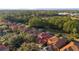 Community overview, showing houses with tile roofs and pools at 384 Orange Cosmos Blvd, Davenport, FL 33837