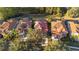 Community view showcasing houses with tile roofs and pools at 384 Orange Cosmos Blvd, Davenport, FL 33837