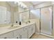 Bright bathroom with double sinks, and a separate shower at 384 Orange Cosmos Blvd, Davenport, FL 33837