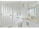 Clean bathroom with a shower, toilet and vanity at 384 Orange Cosmos Blvd, Davenport, FL 33837