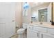 Small bathroom with a toilet and vanity at 384 Orange Cosmos Blvd, Davenport, FL 33837