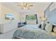 Spacious bedroom with a large bed, dresser, and TV at 384 Orange Cosmos Blvd, Davenport, FL 33837