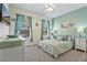 Bedroom with a queen bed and dresser at 384 Orange Cosmos Blvd, Davenport, FL 33837