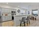 Modern kitchen with white cabinets and breakfast area at 384 Orange Cosmos Blvd, Davenport, FL 33837
