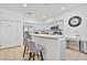 Modern kitchen with stainless steel appliances and island at 384 Orange Cosmos Blvd, Davenport, FL 33837