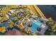 Resort-style pool with lounge chairs and lush landscaping at 384 Orange Cosmos Blvd, Davenport, FL 33837