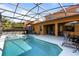Spacious pool and spa with covered patio at 384 Orange Cosmos Blvd, Davenport, FL 33837
