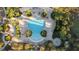 Relaxing pool area with lounge chairs and spa at 384 Orange Cosmos Blvd, Davenport, FL 33837