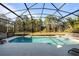 Inviting pool and spa with covered patio at 384 Orange Cosmos Blvd, Davenport, FL 33837