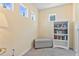 Small study with a bookshelf and storage bench at 384 Orange Cosmos Blvd, Davenport, FL 33837