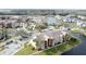 Apartment building near lake with parking and landscaping at 4105 Tropical Isle Blvd # 216, Kissimmee, FL 34741