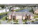 Multi-story apartment building overlooking a lake at 4105 Tropical Isle Blvd # 216, Kissimmee, FL 34741