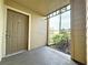 Private apartment entry with access to a covered patio area at 4105 Tropical Isle Blvd # 216, Kissimmee, FL 34741