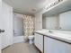 Bathroom with single sink vanity and tub at 4105 Tropical Isle Blvd # 216, Kissimmee, FL 34741