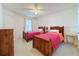 Well-lit bedroom featuring two twin beds at 4105 Tropical Isle Blvd # 216, Kissimmee, FL 34741