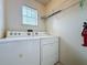 Convenient laundry room with washer and dryer at 4105 Tropical Isle Blvd # 216, Kissimmee, FL 34741