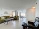 Living room features a comfy seating area and dining space at 4105 Tropical Isle Blvd # 216, Kissimmee, FL 34741