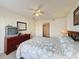 Main bedroom with ensuite bathroom access and dresser at 4105 Tropical Isle Blvd # 216, Kissimmee, FL 34741