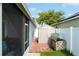 Backyard with shed, wooden crate, and red pavers at 435 Madina Cir, Davenport, FL 33837