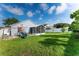 Large backyard with a screened porch and playset at 435 Madina Cir, Davenport, FL 33837