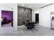 Chic dining area with modern table and chairs adjacent to the kitchen at 435 Madina Cir, Davenport, FL 33837