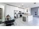 Modern kitchen with stainless steel appliances and island at 435 Madina Cir, Davenport, FL 33837
