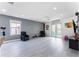 Spacious living area with hardwood floors and access to the backyard at 435 Madina Cir, Davenport, FL 33837