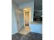Front entry with tile floor and coat closet at 4518 Commander Dr # 1918, Orlando, FL 32822