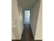 Hallway with carpet and linen closet at 4518 Commander Dr # 1918, Orlando, FL 32822