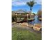 Landscaped pond with gazebo and lush greenery at 4518 Commander Dr # 1918, Orlando, FL 32822
