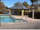 Community pool with a spa and gazebo at 4518 Commander Dr # 1918, Orlando, FL 32822