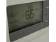 Digital thermostat displaying temperature at 4518 Commander Dr # 1918, Orlando, FL 32822