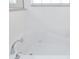 Clean bathroom with large soaking tub and granite countertop at 4608 Cumbrian Lakes Dr, Kissimmee, FL 34746