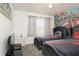 ' bedroom with twin beds, TV, and Cars mural at 4608 Cumbrian Lakes Dr, Kissimmee, FL 34746