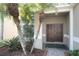 Double-door entry with landscaping and walkway at 4608 Cumbrian Lakes Dr, Kissimmee, FL 34746