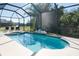 Screened pool and spa with dolphin mosaic at 4608 Cumbrian Lakes Dr, Kissimmee, FL 34746