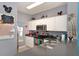 White kitchen cabinets, stainless steel appliances, and dark countertops at 4724 Vero Beach Pl, Kissimmee, FL 34746