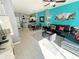 Open living space with kitchen, dining, and living room areas at 4724 Vero Beach Pl, Kissimmee, FL 34746