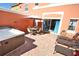 Outdoor patio with hot tub and seating area at 4724 Vero Beach Pl, Kissimmee, FL 34746