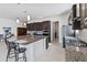 Spacious kitchen with granite countertops and dark cabinetry at 5014 E Fountainwood Dr, Saint Cloud, FL 34772