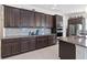 Modern kitchen boasting ample cabinetry and granite counters at 5014 E Fountainwood Dr, Saint Cloud, FL 34772