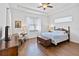 Spacious main bedroom with hardwood floors and a ceiling fan at 5014 E Fountainwood Dr, Saint Cloud, FL 34772