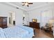 Main bedroom with hardwood floors and plenty of natural light at 5014 E Fountainwood Dr, Saint Cloud, FL 34772