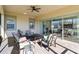 Covered patio with seating area and view of the backyard at 5014 E Fountainwood Dr, Saint Cloud, FL 34772