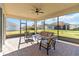Relaxing screened patio with seating area, perfect for outdoor enjoyment at 5014 E Fountainwood Dr, Saint Cloud, FL 34772