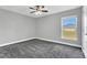 Bright bedroom with carpet and ceiling fan at 534 Bristol Cir, Kissimmee, FL 34758