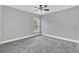 Spacious bedroom with carpet and ceiling fan at 534 Bristol Cir, Kissimmee, FL 34758