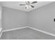 Well-lit bedroom with tile floor and ceiling fan at 534 Bristol Cir, Kissimmee, FL 34758