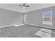Bright bedroom with carpet and ceiling fan at 534 Bristol Cir, Kissimmee, FL 34758