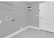 Laundry room with shelving and tile floor at 534 Bristol Cir, Kissimmee, FL 34758